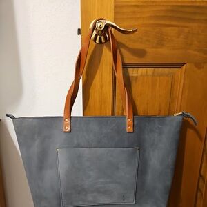 Elegant Gray Shoulder Bag with Tan Straps